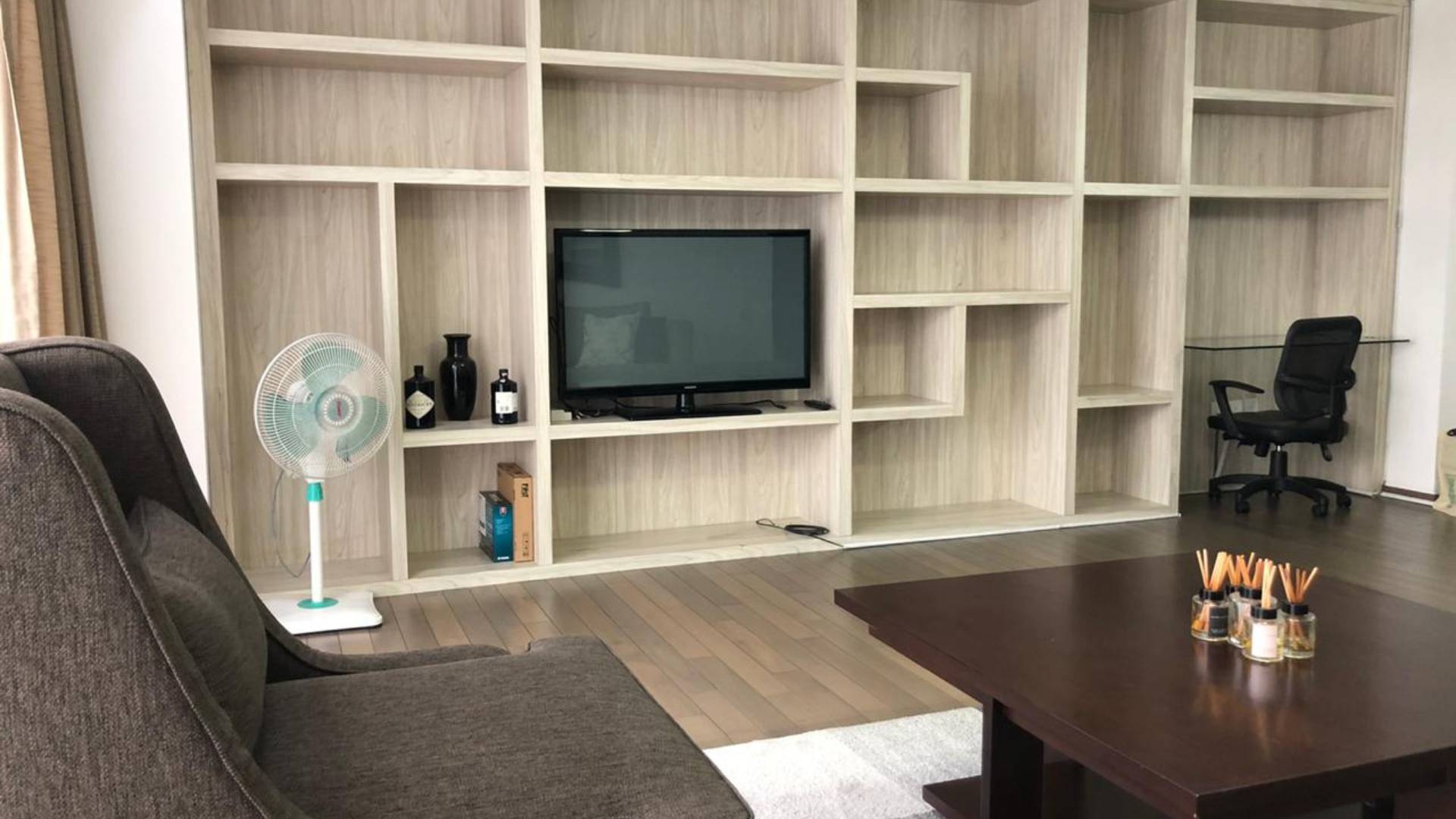 VERDE ONE-2BR-LIVING ROOM AND DETAIL CABINET TV