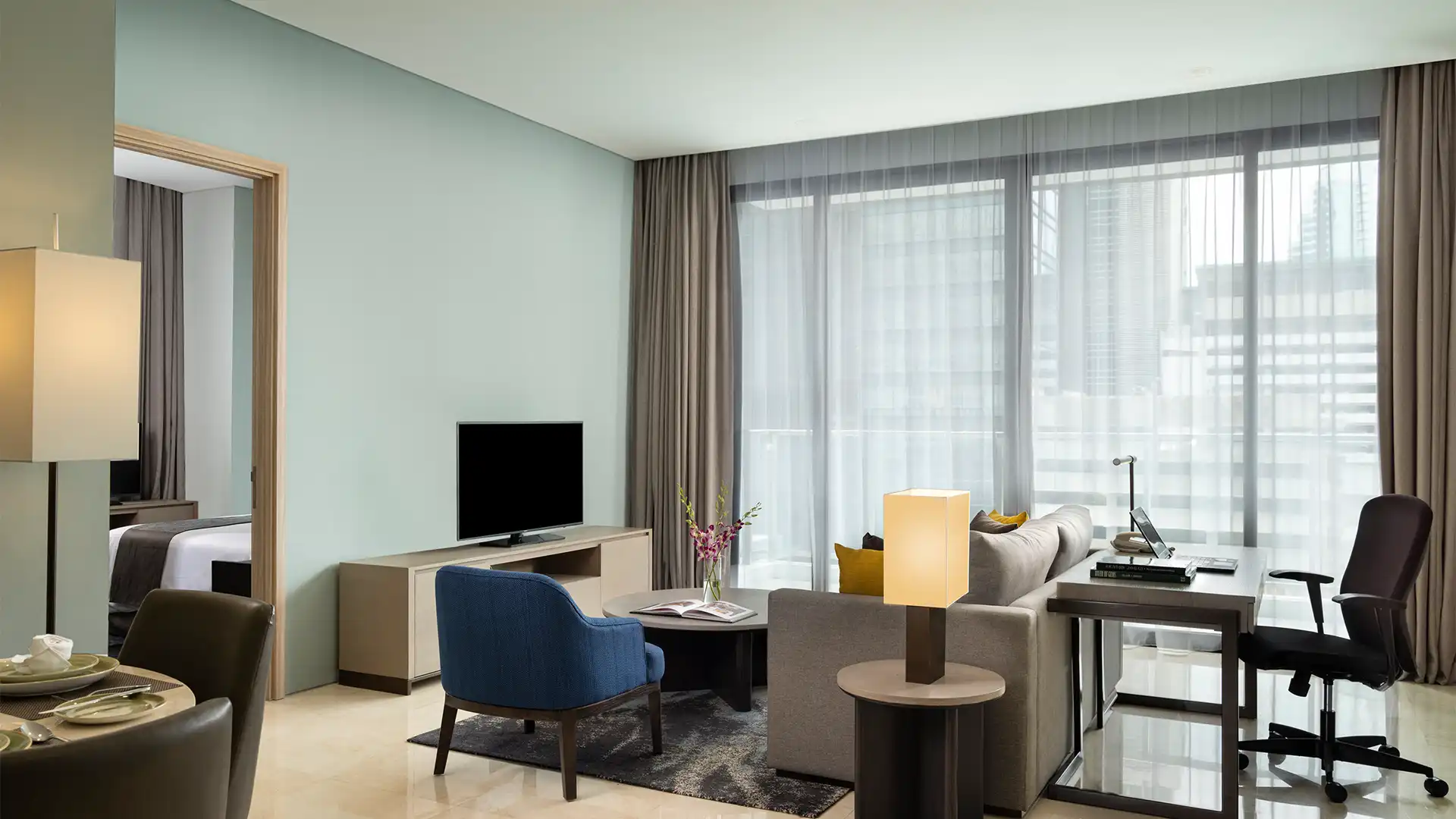 MANGKULUHUR-2BR-Living Area with Working Desk