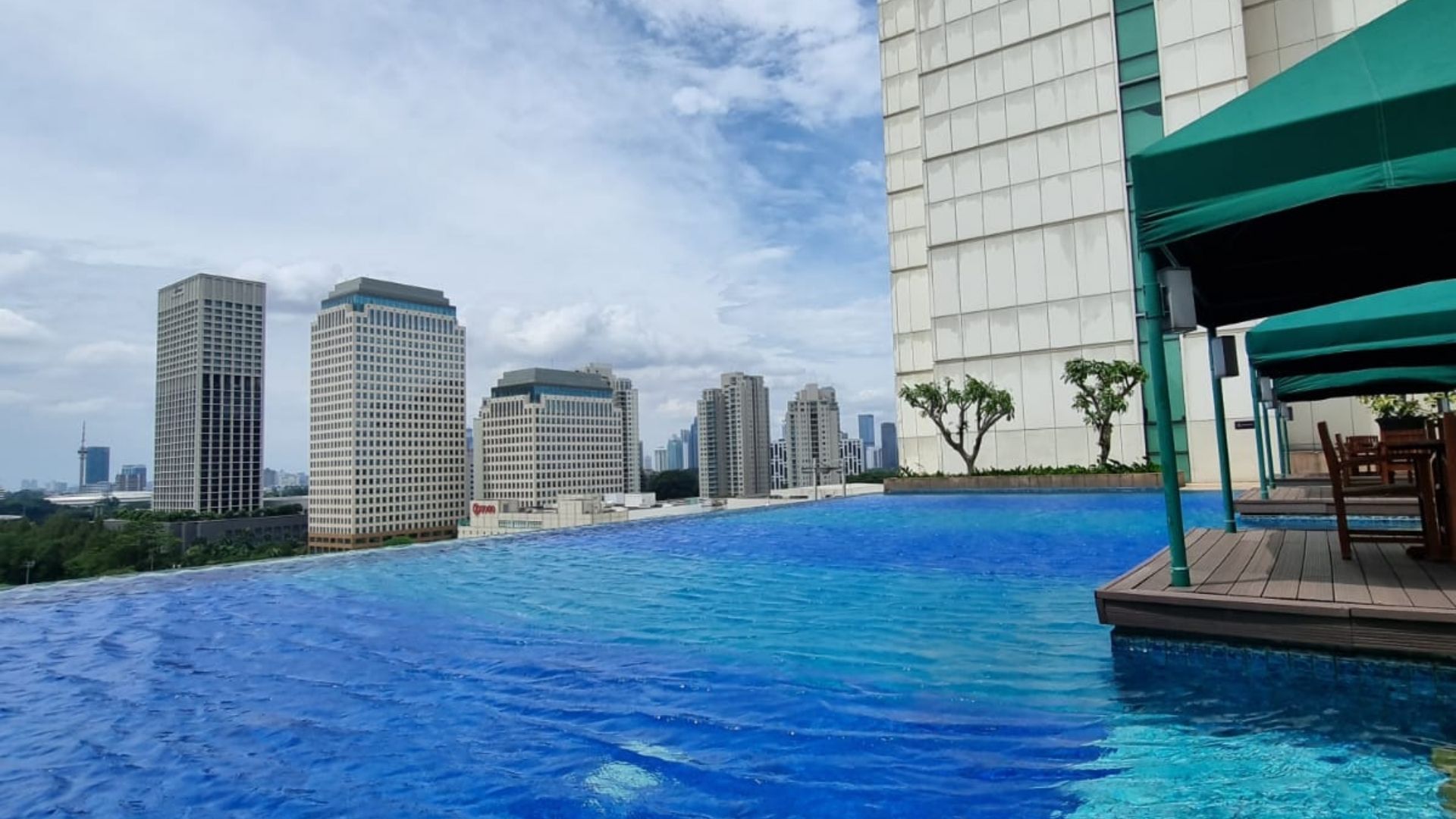 Senayan City Residence-Swimming pool area facilities Senayan City Residence – Premium 3BR Apartment