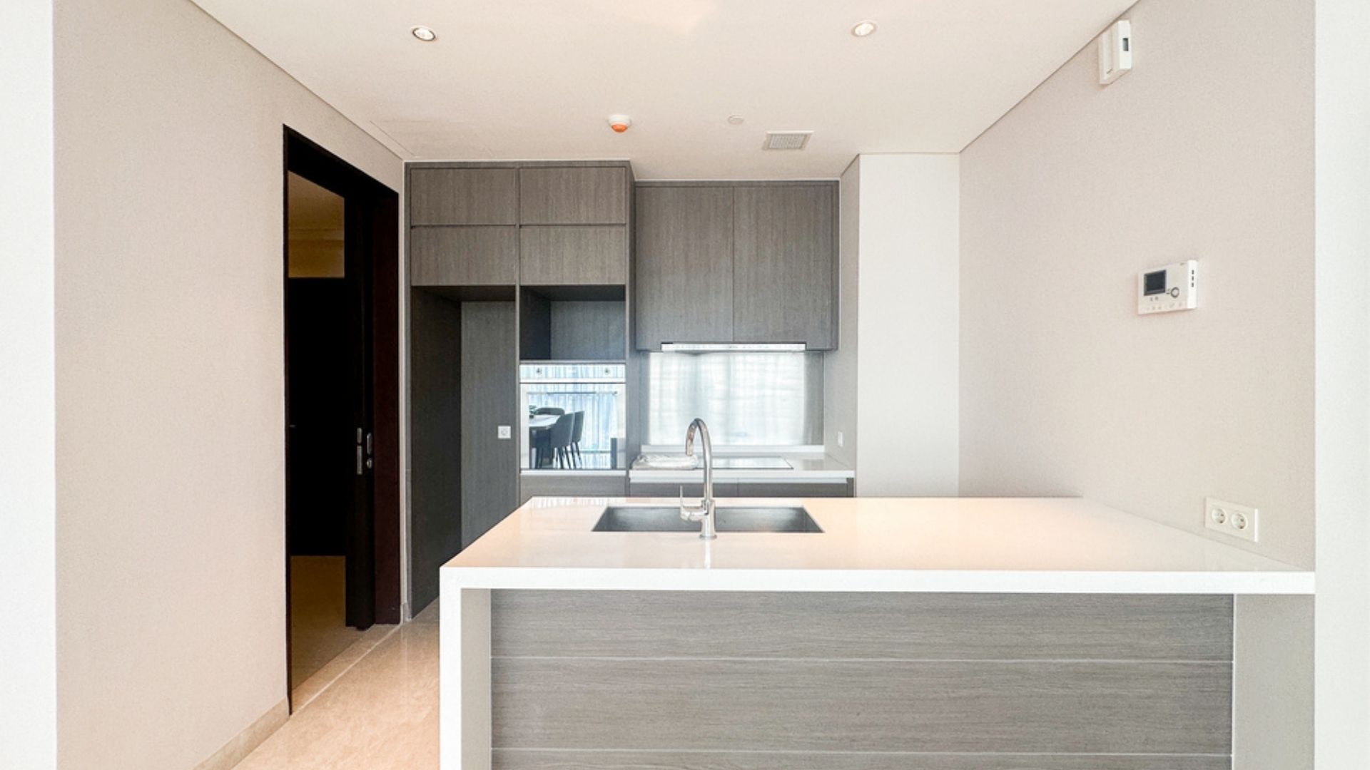 Casa Domaine-2BR-Built-In Kitchen Set Smart 2BR City Apartment Designed for Executive Living at Casa Domaine