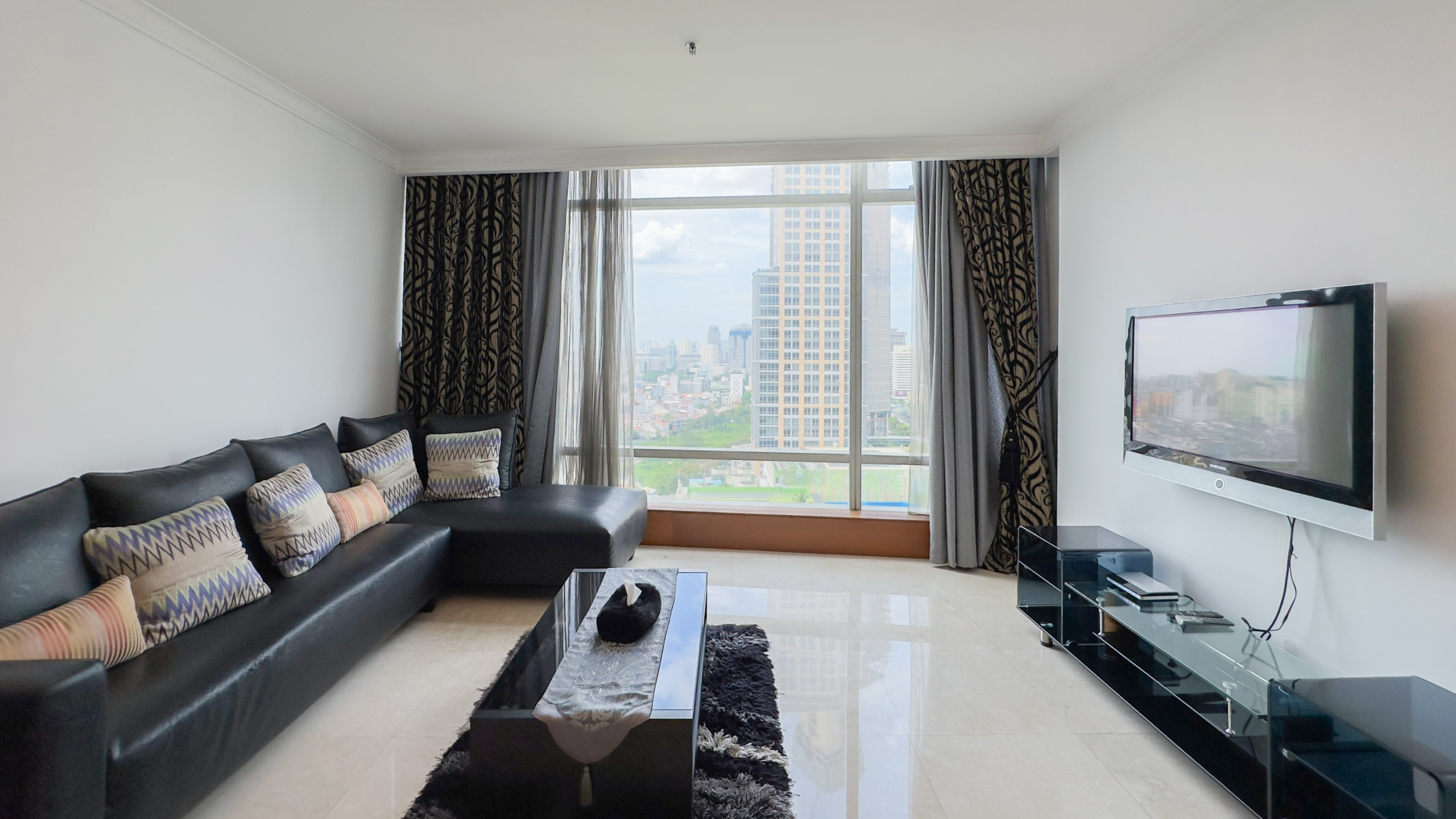 Kempinski Private Residence-2BR-Living room city view Spacious Two-Bedroom Kempinski Private Residence Residence for Discerning Urban Livin